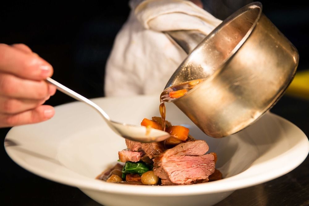 The Millstone, Mellor Hotel Blackburn  Eksteriør billede A chef plating a dish
